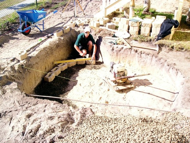 The ag pipe connects to a soakaway pit at the front of the house. Runoff collects here and soaks into the ground. It also acts as a sediment trap